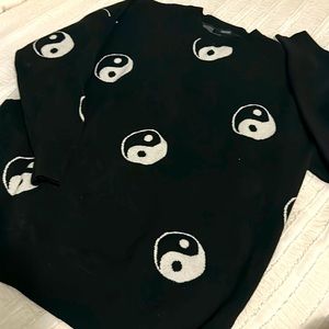 Men’s Yin Yang sweater.